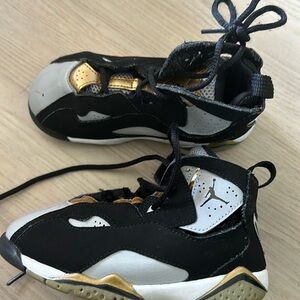 Black and gold Jordan’s